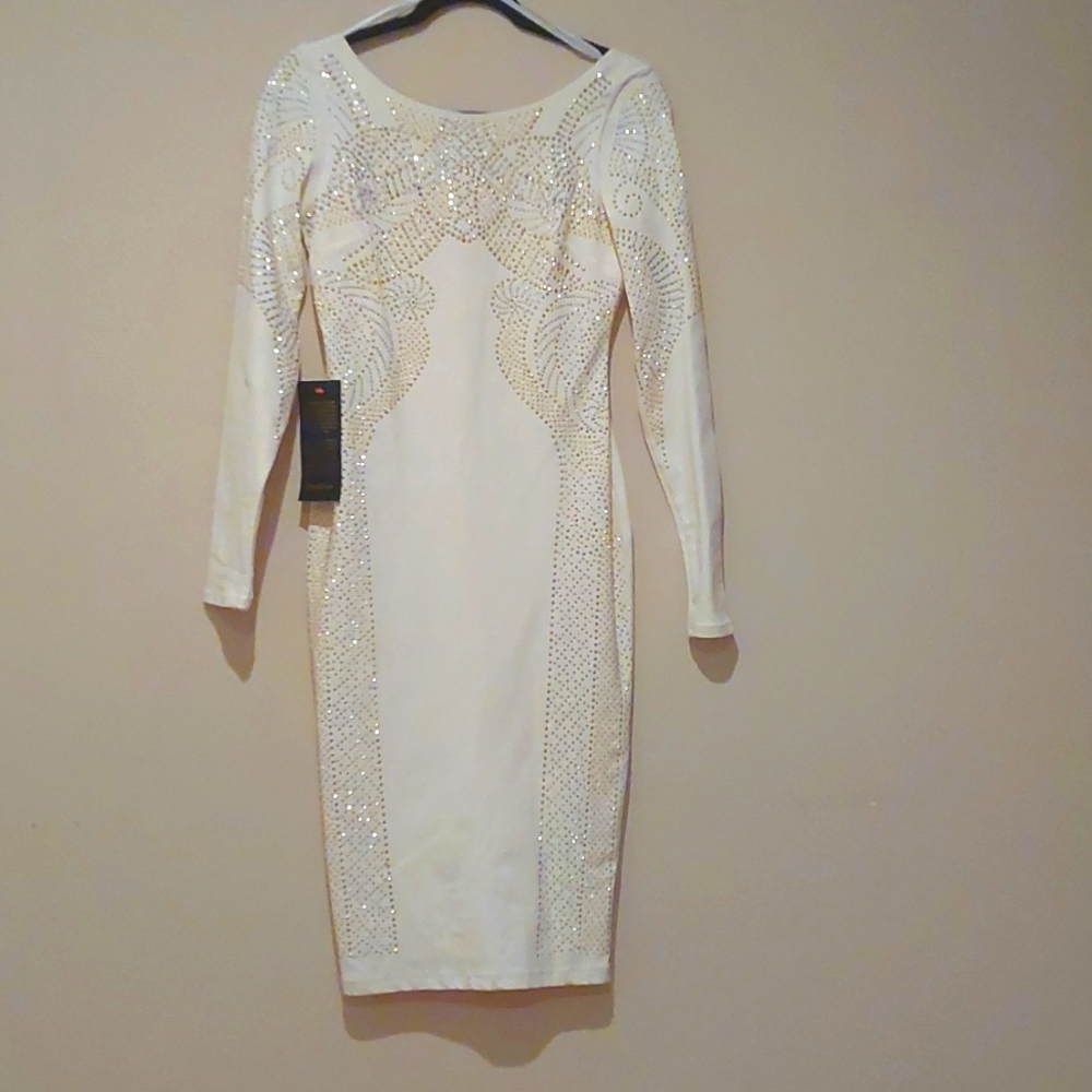 VINTAGE BEBE body cone dress with studs.